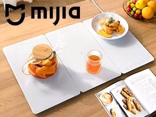 Разогреет ни на шутку! Xiaomi представила доску для подогрева еды и напитков