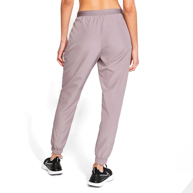 Брюки Nike W NK SWOOSH RUN TRK PANT / Женский / XS / Сиреневый photo 3